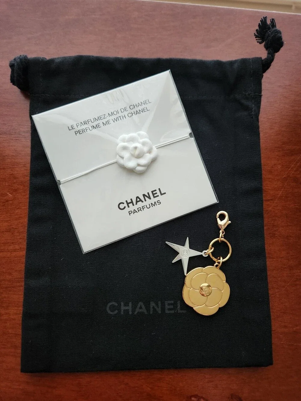 Chanel Camelia Charm Chanel Perfume Me Bracelet